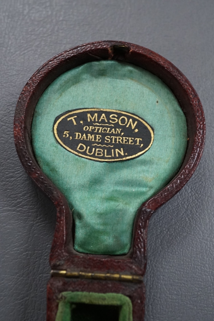 A pocket aneroid barometer by J. Watts, Optician, Dublin, in a fitted leather case with a label for ‘T. Mason, Optician, 5, Dame Street, Dublin’, to the inside of the lid.
